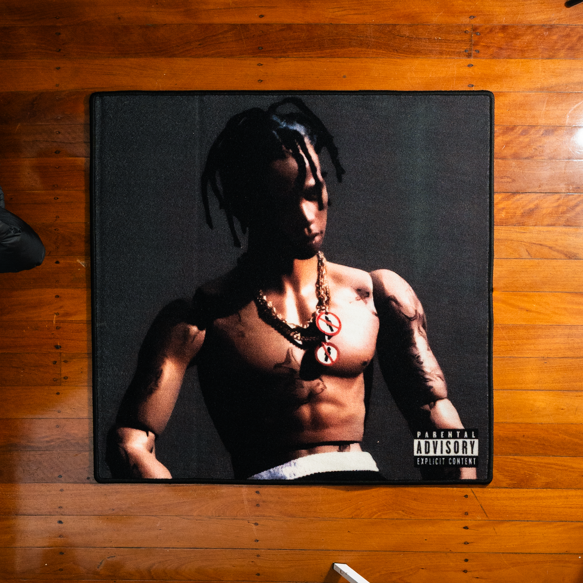 Travis Scott Rodeo album rug laid out on a floor
