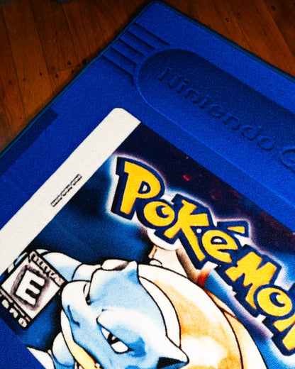 Pokemon Blue cartridge cut-out rug close up on the printed label