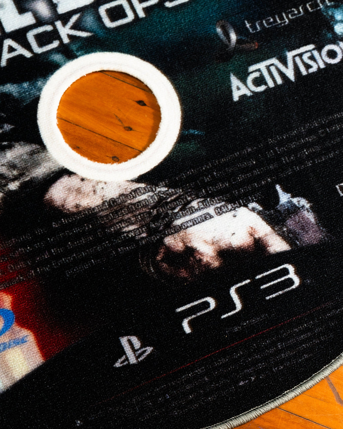 Black Ops disc rug in a gaming setup