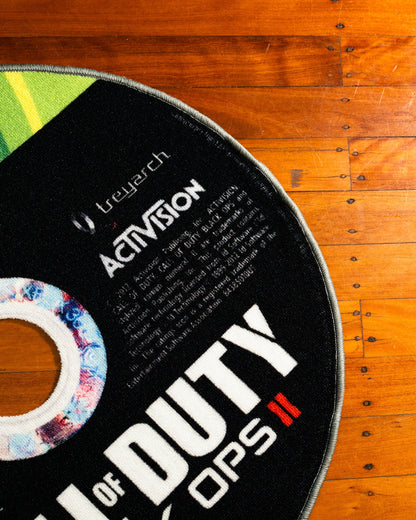 Black Ops II disc rug shown for scale in a room