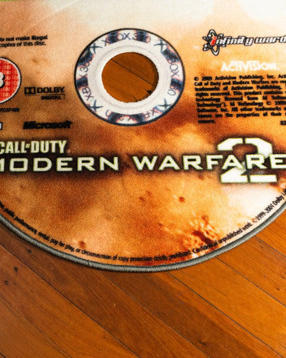 Modern Warfare 2 disc rug shown for scale in a room