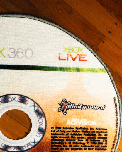 Modern Warfare 2 disc rug in a gaming setup