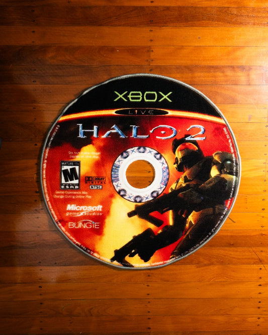 Halo 2 disc rug laid out on a bedroom floor