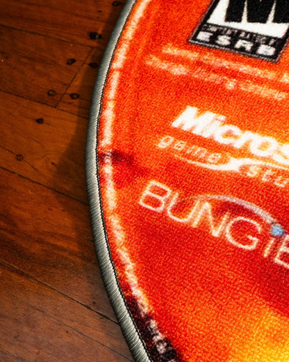 Halo 2 disc rug in a gaming setup