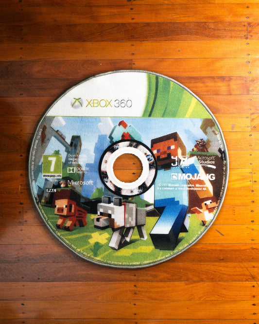 Minecraft Xbox 360 disc rug laid out on a floor