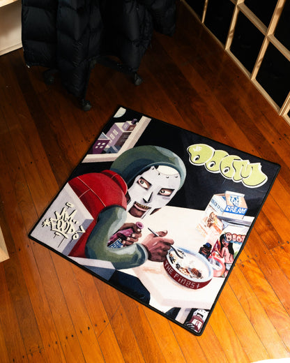 MF DOOM MM FOOD album rug in a bedroom