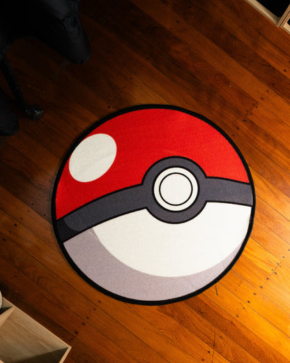 Poke Ball round rug in a bedroom