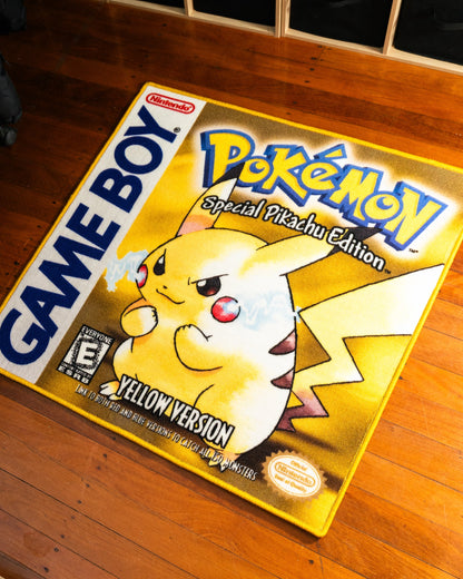 Pokemon Yellow box art rug shown for scale in a room