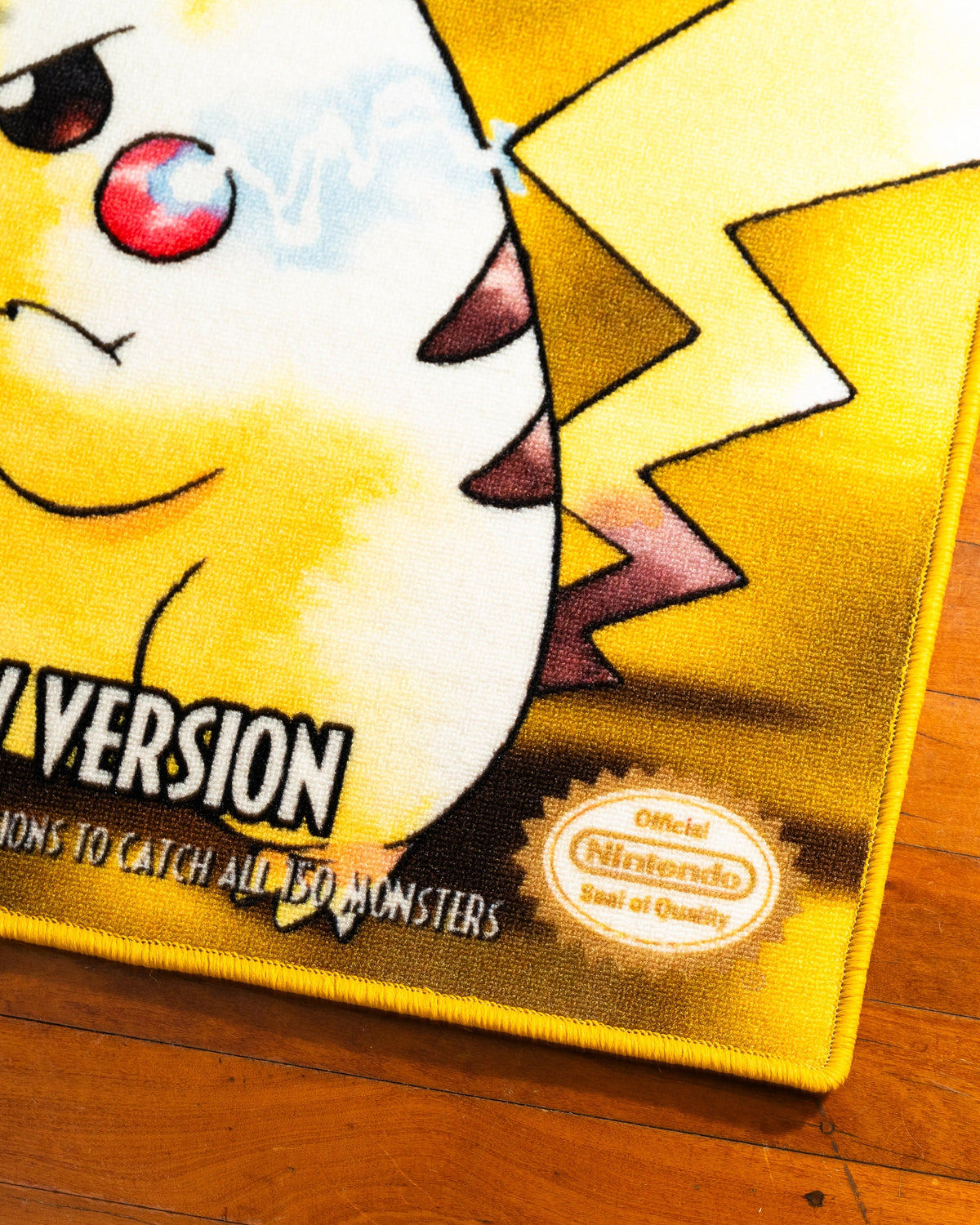 Pokemon Yellow box art rug close up on the printed surface