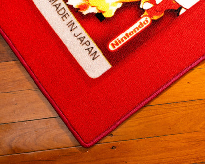 Pokemon Red cartridge cut-out rug shown for scale in a room