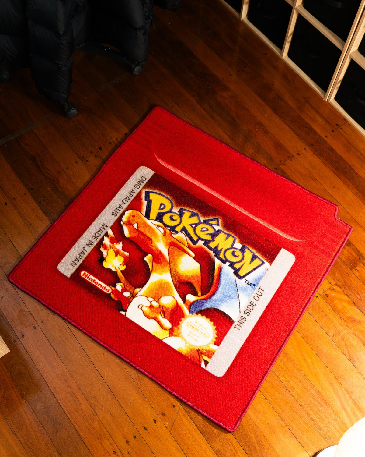 Pokemon Red cartridge cut-out rug detail shot