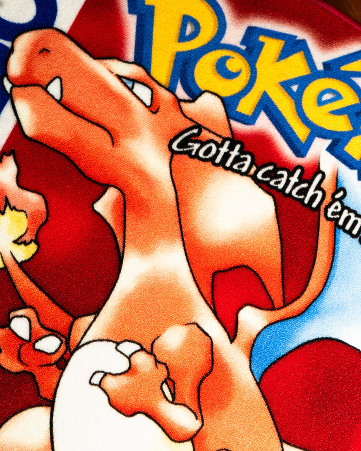 Pokemon Red box art rug close up on the printed surface