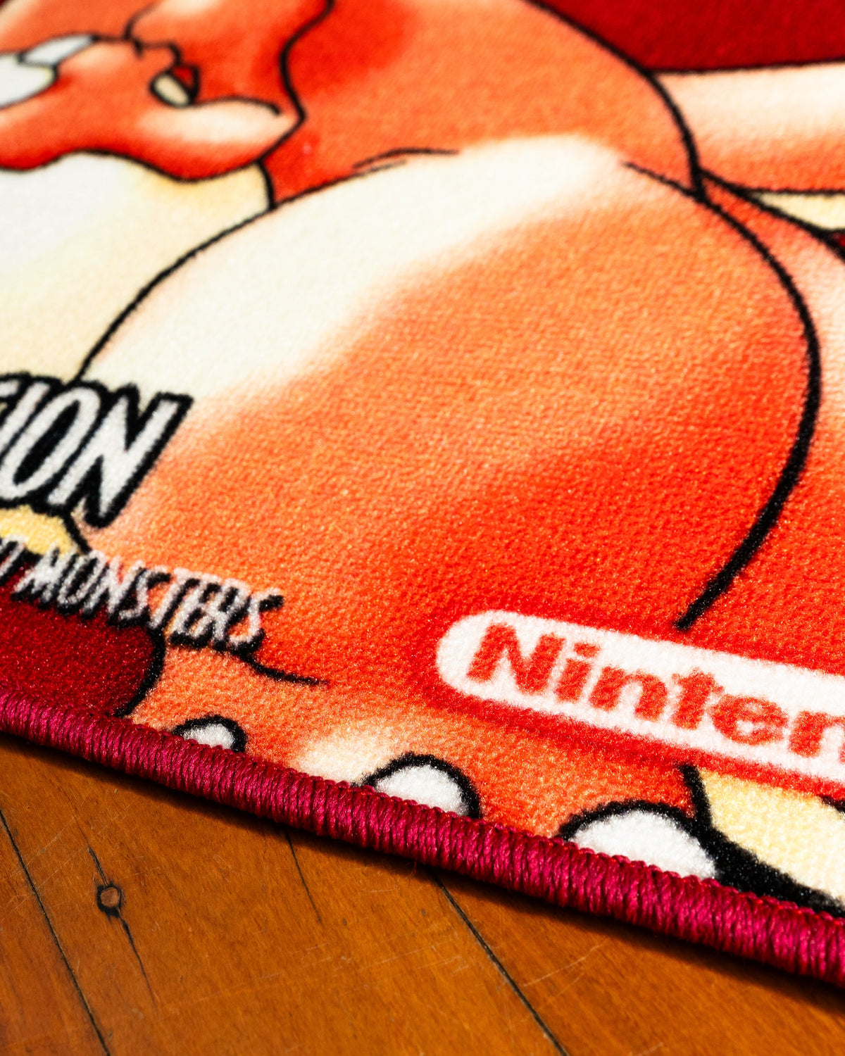 Pokemon Red box art rug in a bedroom