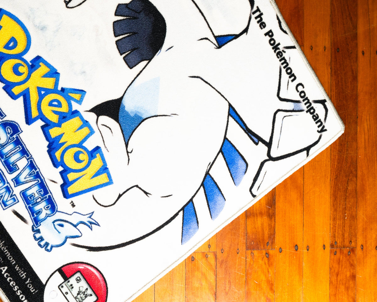 Pokemon SoulSilver box art rug shown for scale in a room