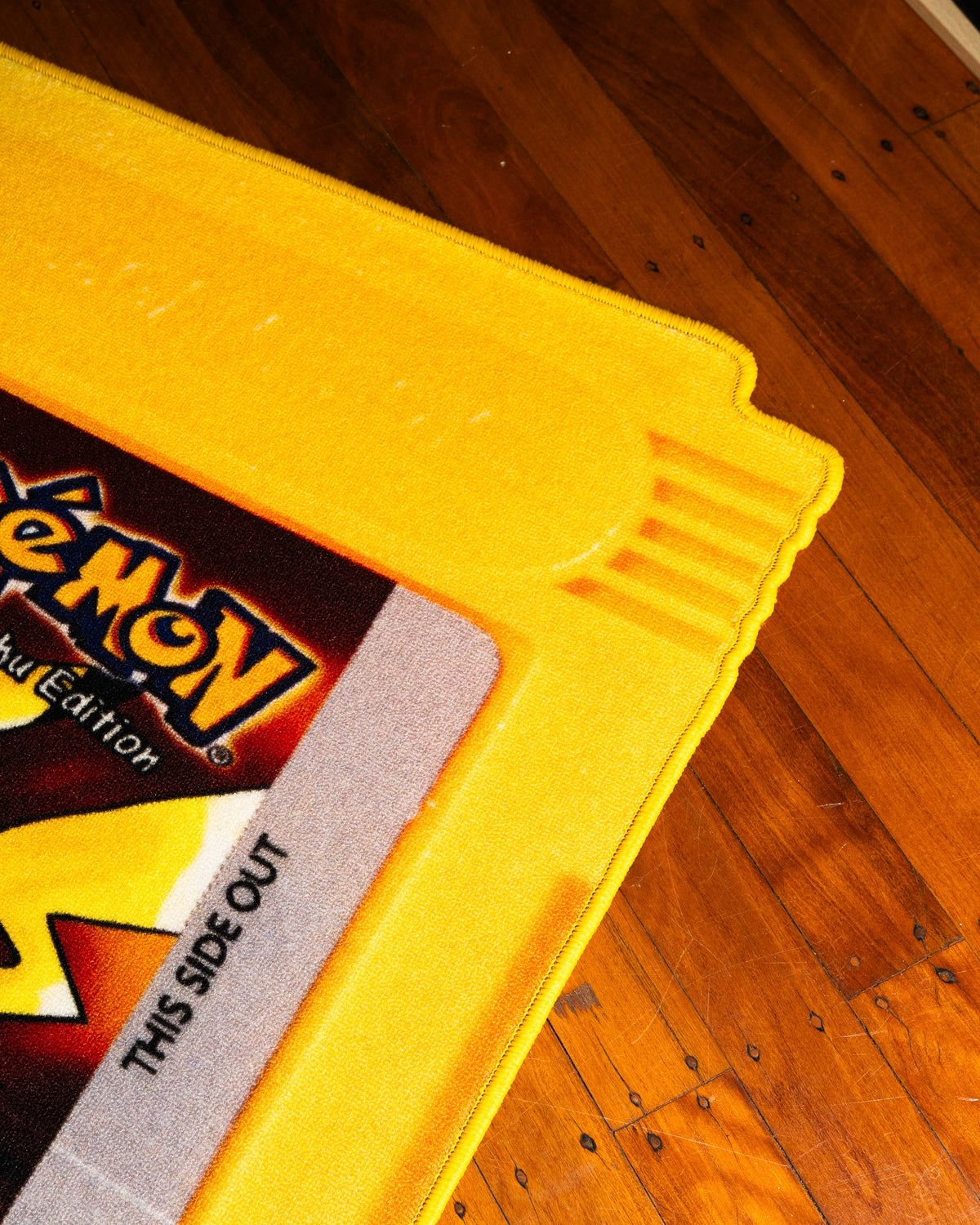 Pokemon Yellow cartridge cut-out rug close up on the printed label